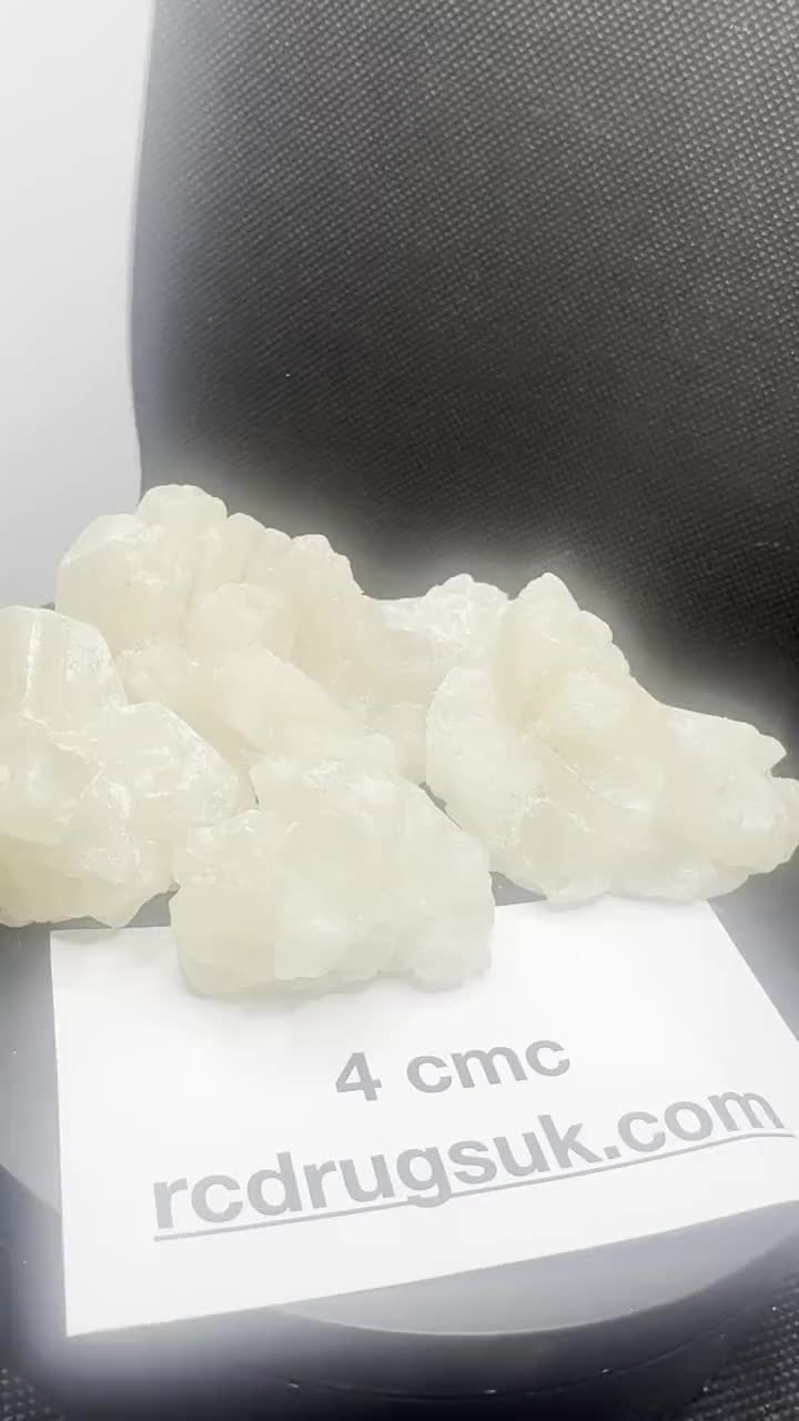 4-CMC crystals with a batch card.